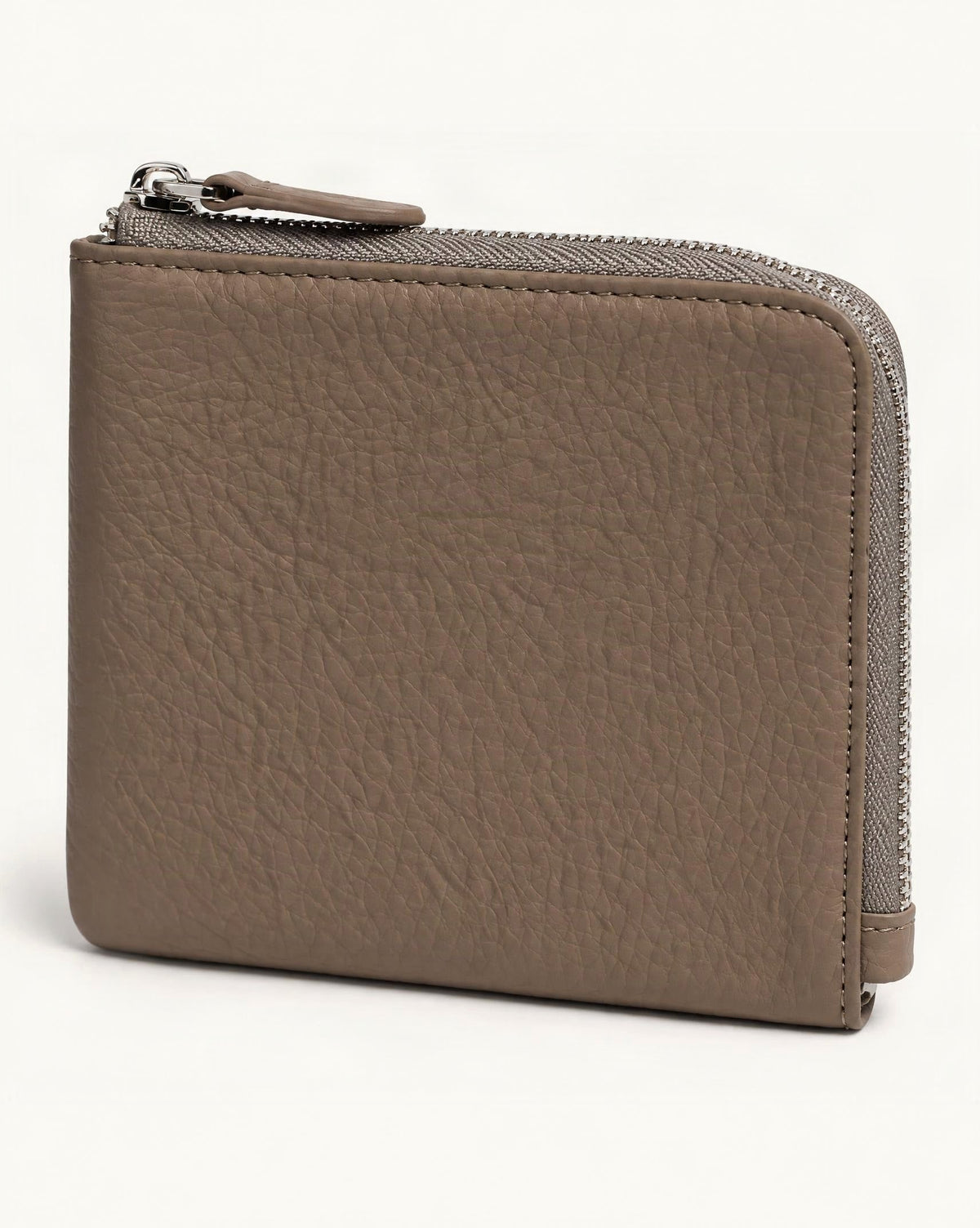 Cowhide Leather Short RFID-Blocking Wallet — front three-quarter view on a warm white background
