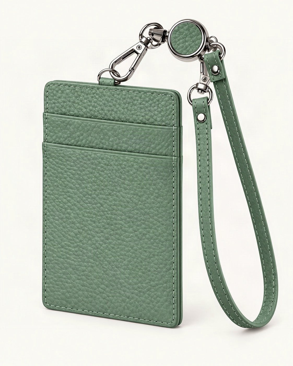 Leather Slim ID Badge Holder with Reel & Strap — front three-quarter view on a warm white background