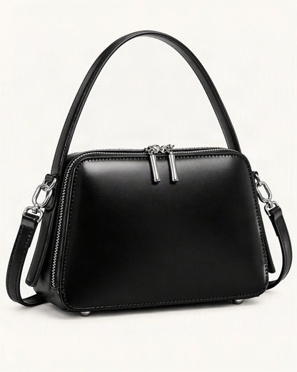 Cowhide Leather Small Crossbody Bag – Color Options — front three-quarter view on a warm white background