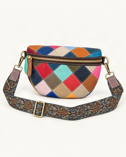 Top-Grain Cowhide Small Crossbody Bag — front three-quarter view on a warm white background