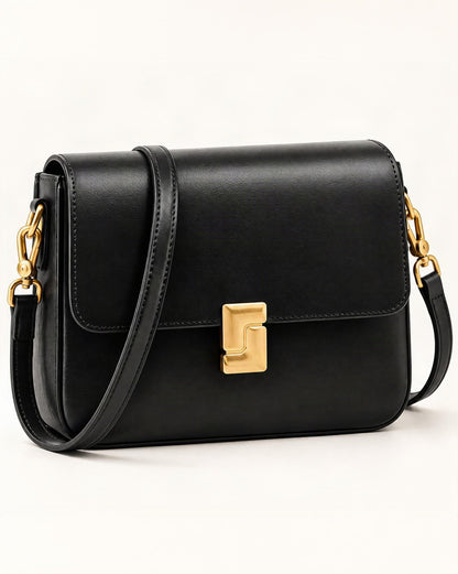 Cowhide Leather Small Crossbody Bag with Turn-Lock Closure — front three-quarter view on a warm white background