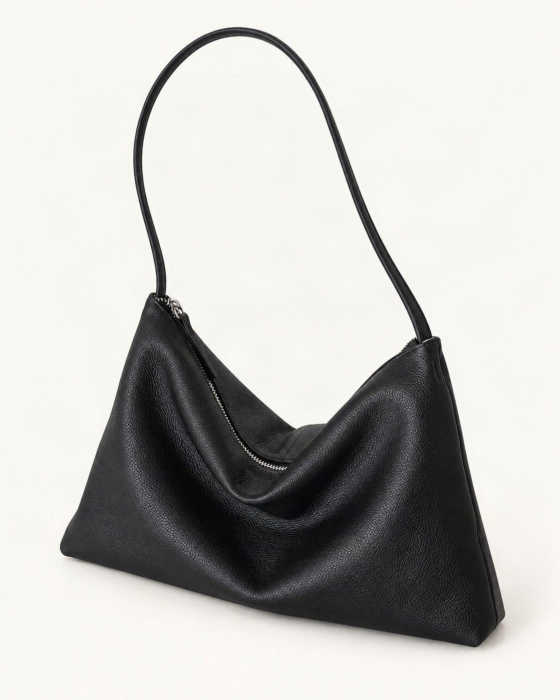 Top-Grain Cowhide Hobo Shoulder Bag — front three-quarter view on a warm white background