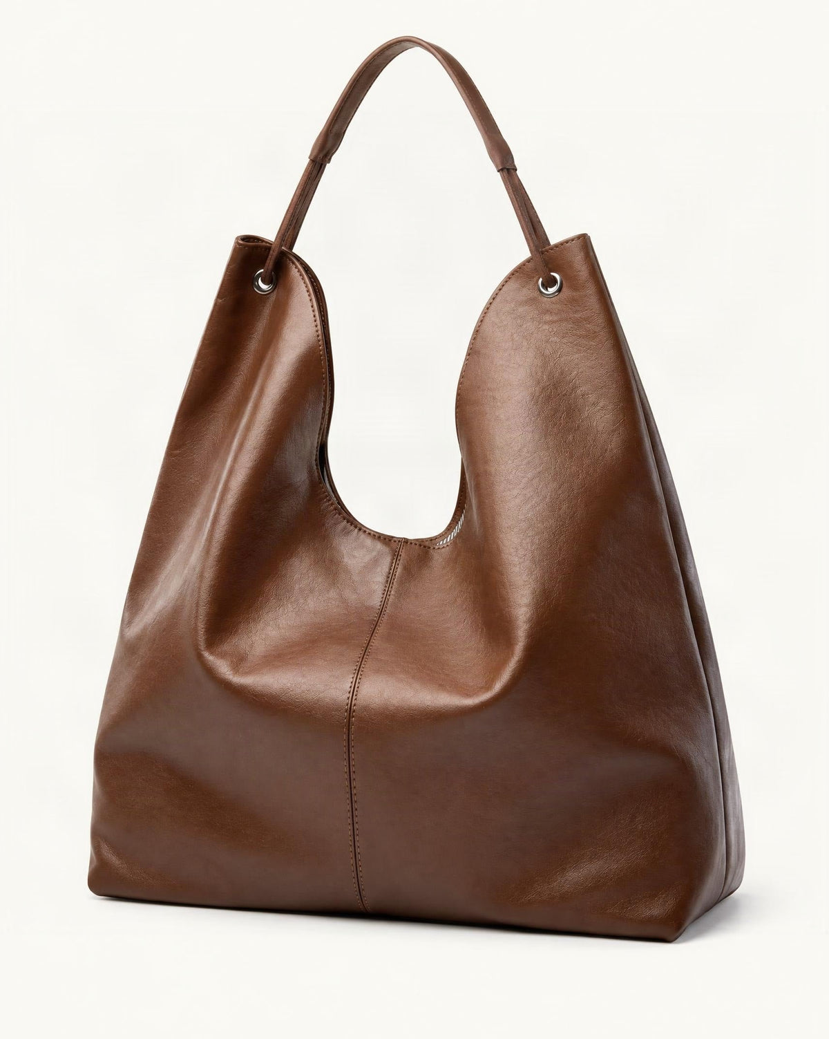 Cowhide Leather Small Hobo Shoulder Bag — front three-quarter view on a warm white background