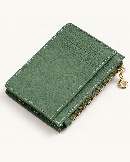 Top-Grain Cowhide Slim Card Holder with Zip Coin Pocket — front three-quarter view on a warm white background