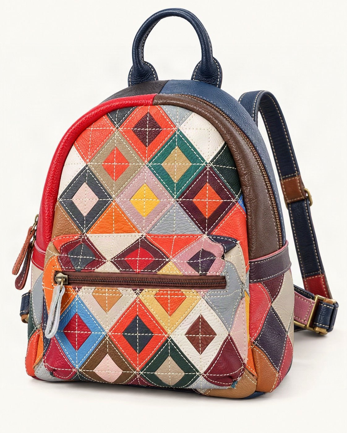 Top-Grain Cowhide Patchwork Backpack — front three-quarter view on a warm white background