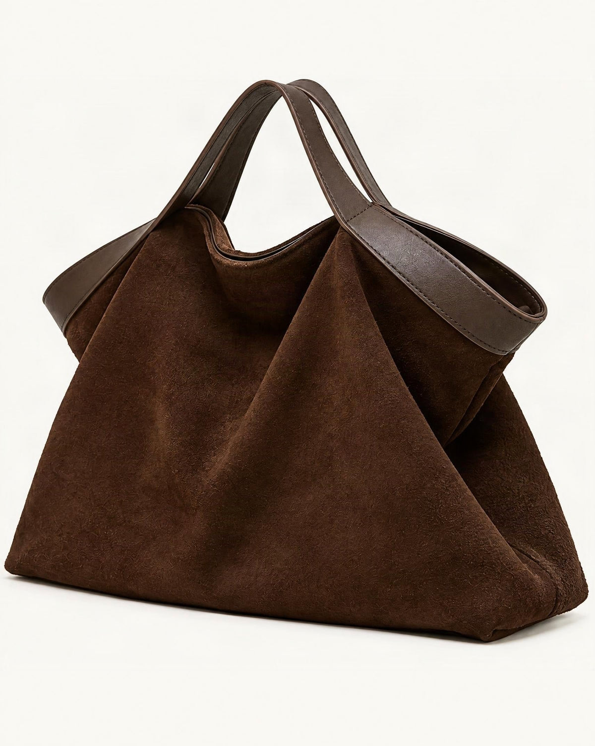 Cowhide Nubuck Leather Crossbody Tote Bag — front three-quarter view on a warm white background
