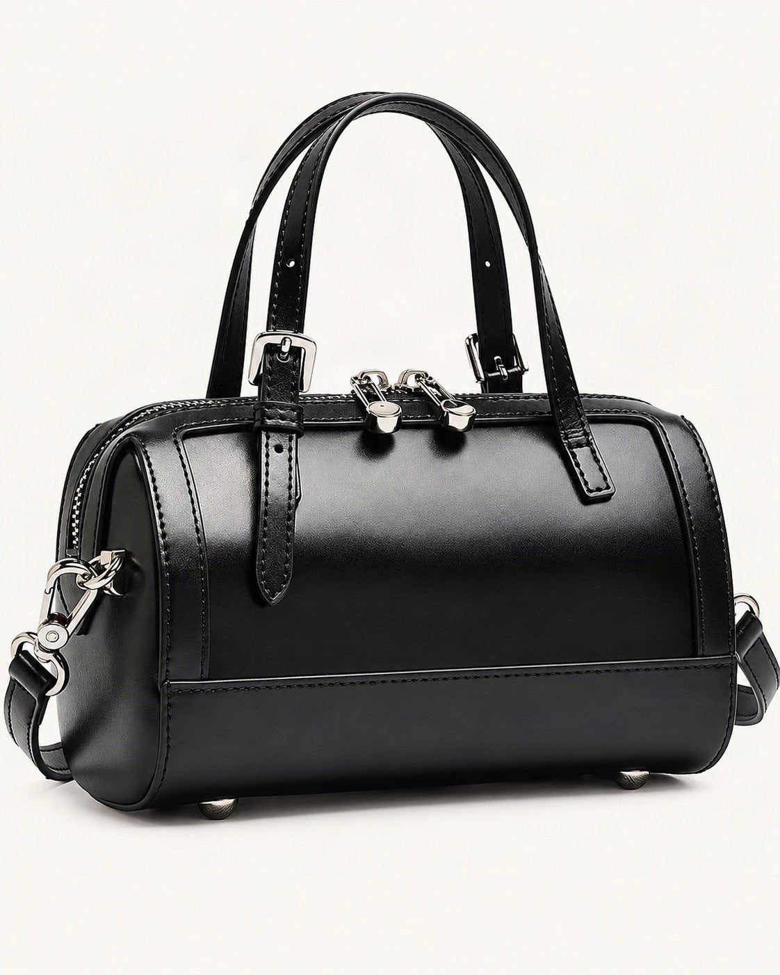 Cowhide Leather Mini Boston Bowling Bag — front three-quarter view on a warm white background
