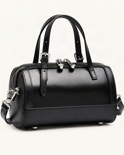 Cowhide Leather Mini Boston Bowling Bag — front three-quarter view on a warm white background