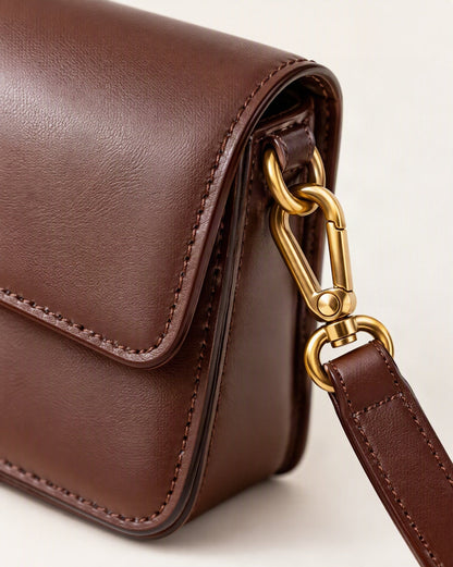 Cowhide Leather Small Shoulder Bag with Flap Closure hardware and smooth cowhide detail, close up