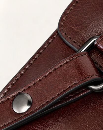 Cowhide Leather Small Backpack with Buckle Flap hardware and cowhide detail, close up