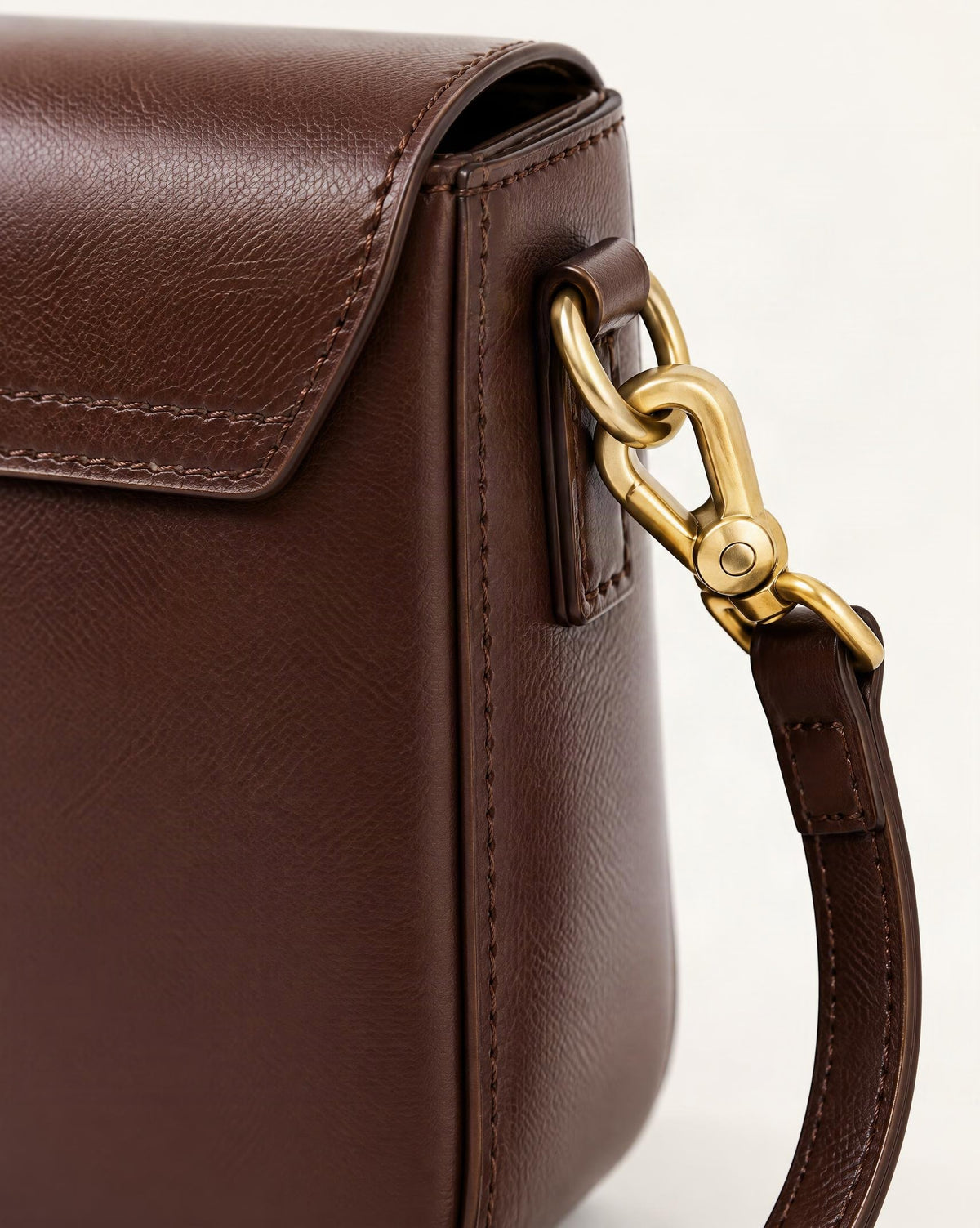 Cowhide Leather Small Crossbody Bag with Turn-Lock Closure hardware and smooth cowhide detail, close up