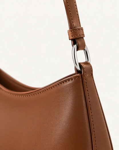 Cowhide Leather Underarm Shoulder Bag hardware and cowhide detail, close up