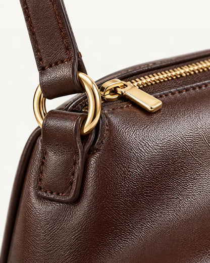 Cowhide Leather Small Crossbody Bag with Adjustable Strap hardware and cowhide detail, close up
