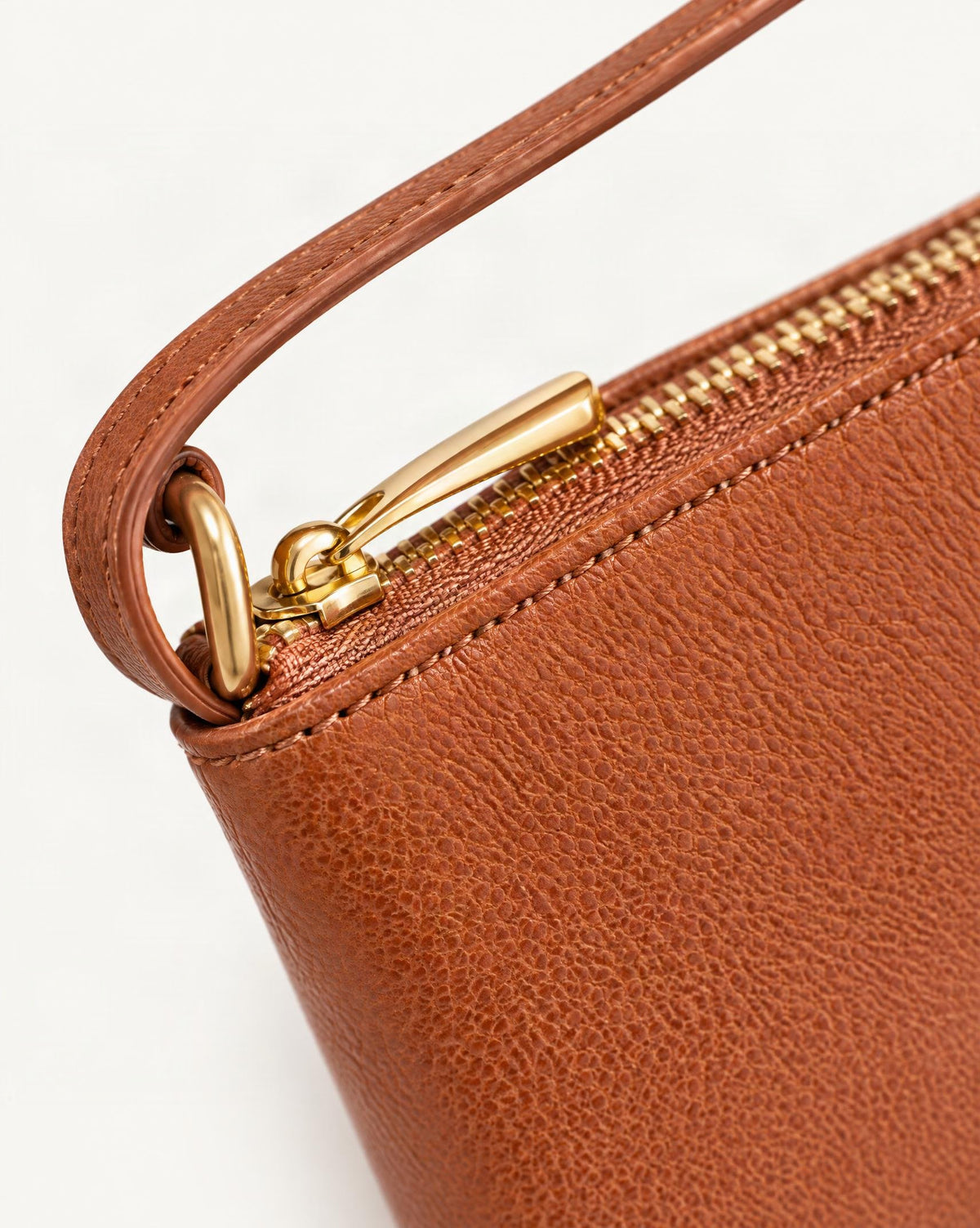Cowhide Leather Long Wallet with Wrist Strap hardware and pebbled cowhide detail, close up