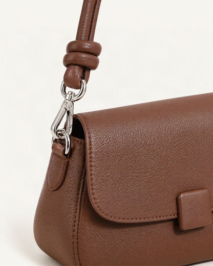 Cowhide Leather Mini Crossbody Bag hardware and cowhide detail, close up