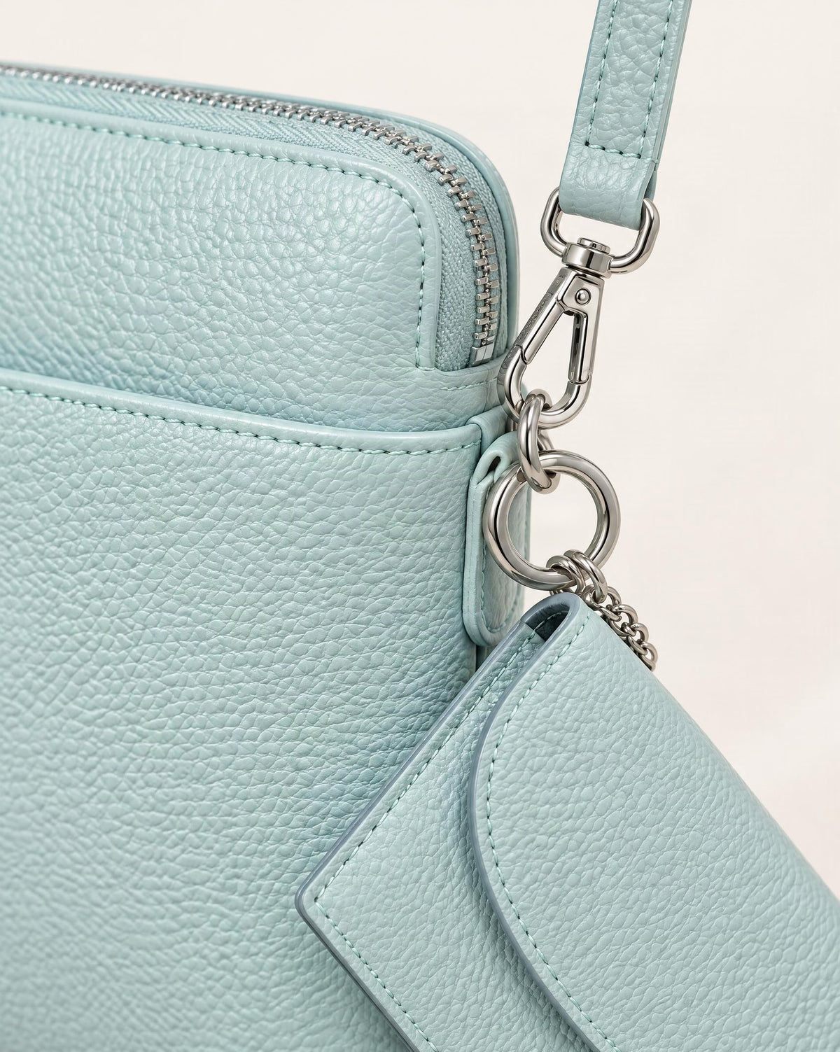 Top-Grain Cowhide Leather Mini Crossbody Phone Bag hardware and cowhide detail, close up