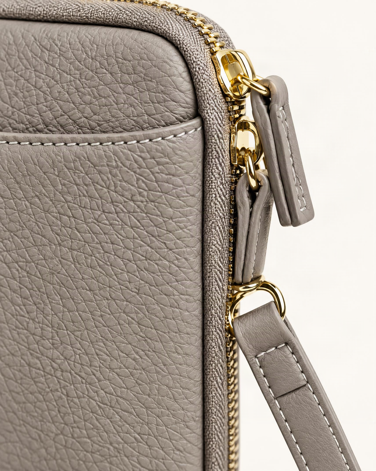 Cowhide Leather Phone Crossbody with Card Slots hardware and cowhide detail, close up