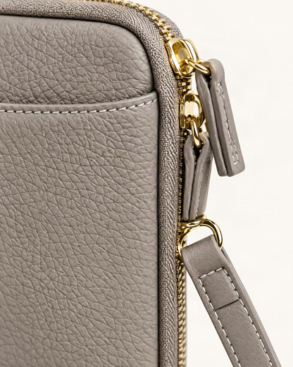 Cowhide Leather Phone Crossbody with Card Slots hardware and cowhide detail, close up