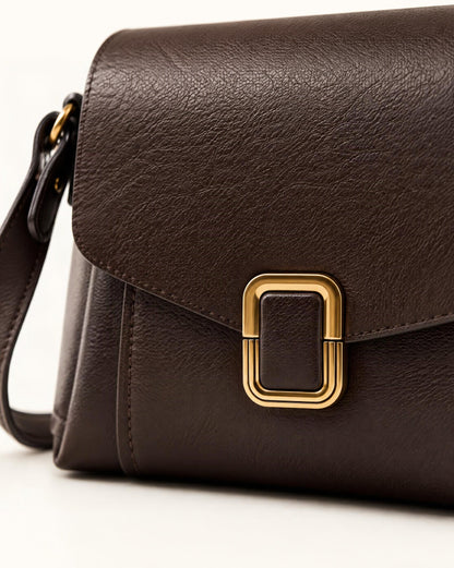 Cowhide Leather Small Crossbody Bag with Adjustable Strap hardware and cowhide detail, close up