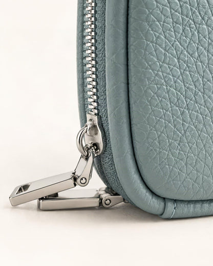 Pebbled Leather Mini Cosmetic Pouch hardware and pebbled cowhide detail, close up