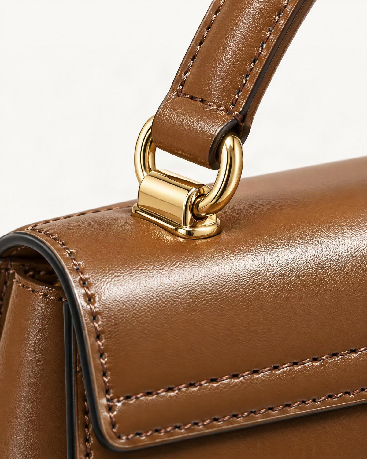 Cowhide Leather Baguette Crossbody Shoulder Top Handle hardware and cowhide detail, close up