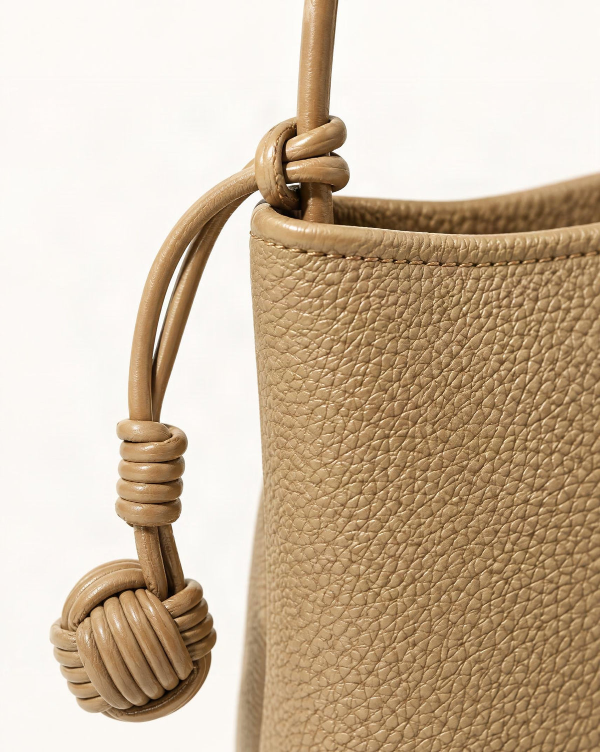 Cowhide Leather Micro Bucket Phone Crossbody Bag hardware and cowhide detail, close up