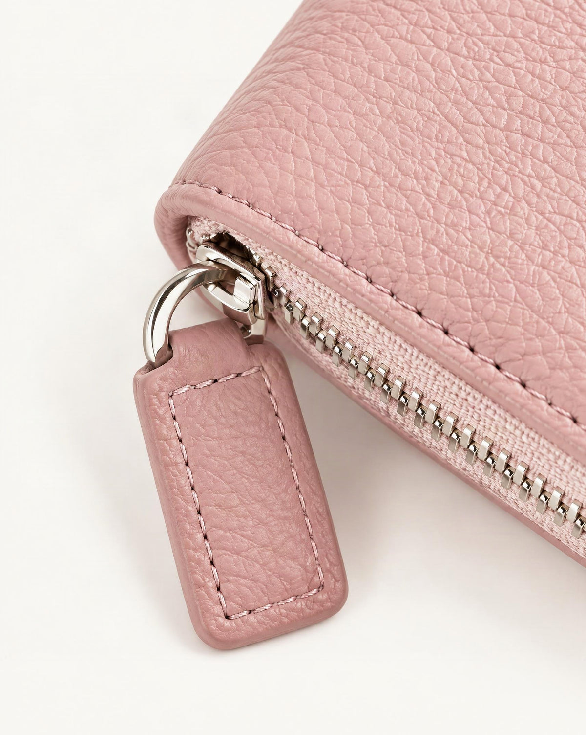 Cowhide Leather Compact Bi-Fold Wallet hardware and pebbled cowhide detail, close up