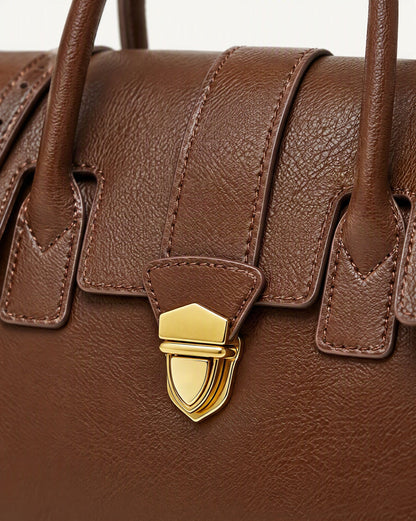 Top-Grain Cowhide Small Plus Satchel Bag hardware and cowhide detail, close up
