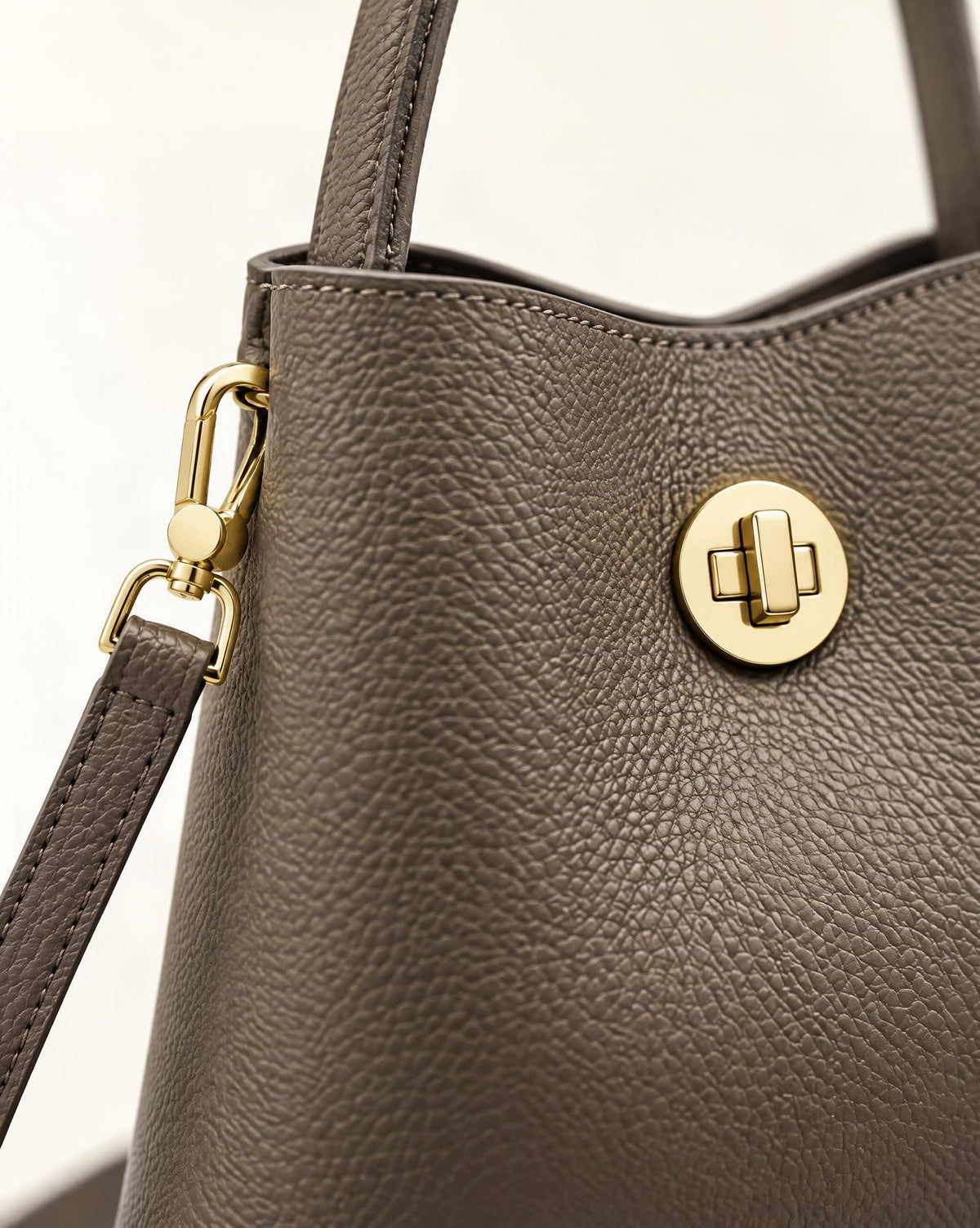 Top-Grain Cowhide Small Bucket Bag hardware and cowhide detail, close up