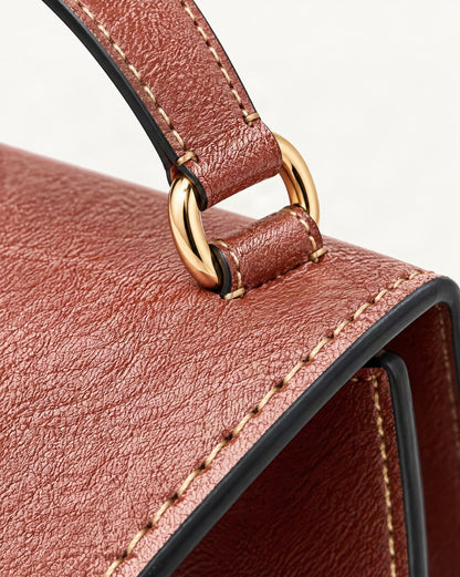 Cowhide Leather Small Messenger Crossbody Bag hardware and cowhide detail, close up