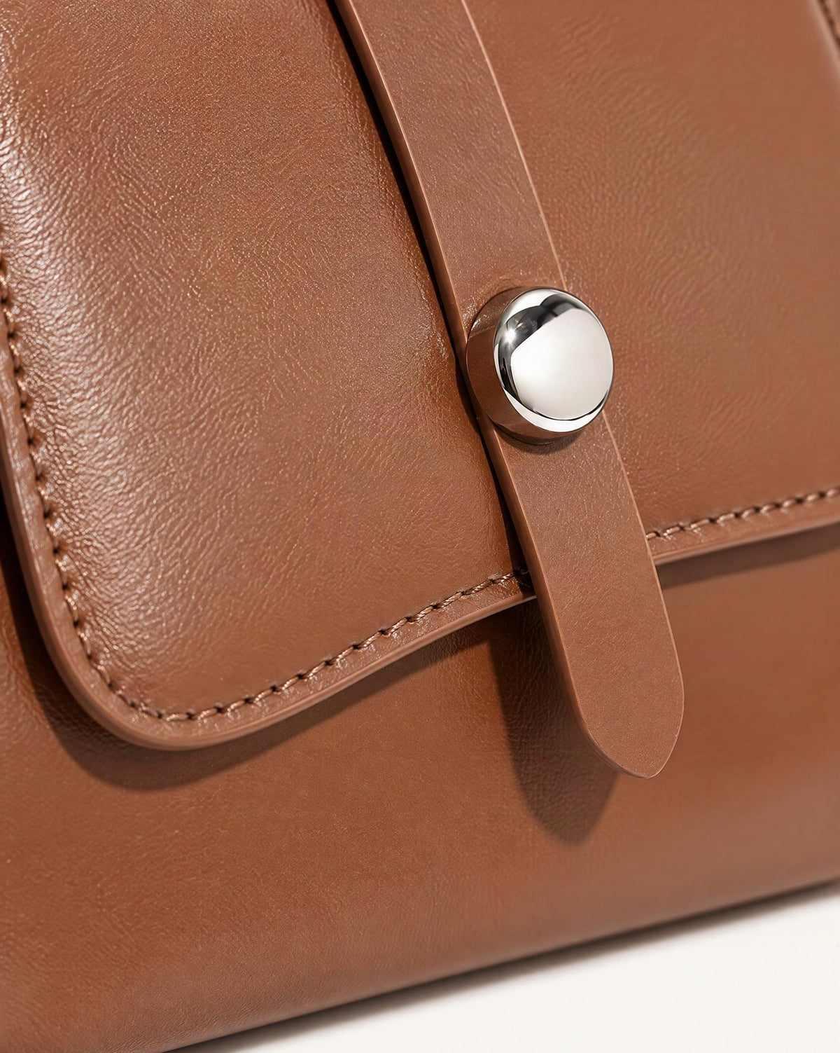 Genuine Leather Envelope Shoulder Bag with Adjustable Strap hardware and cowhide detail, close up