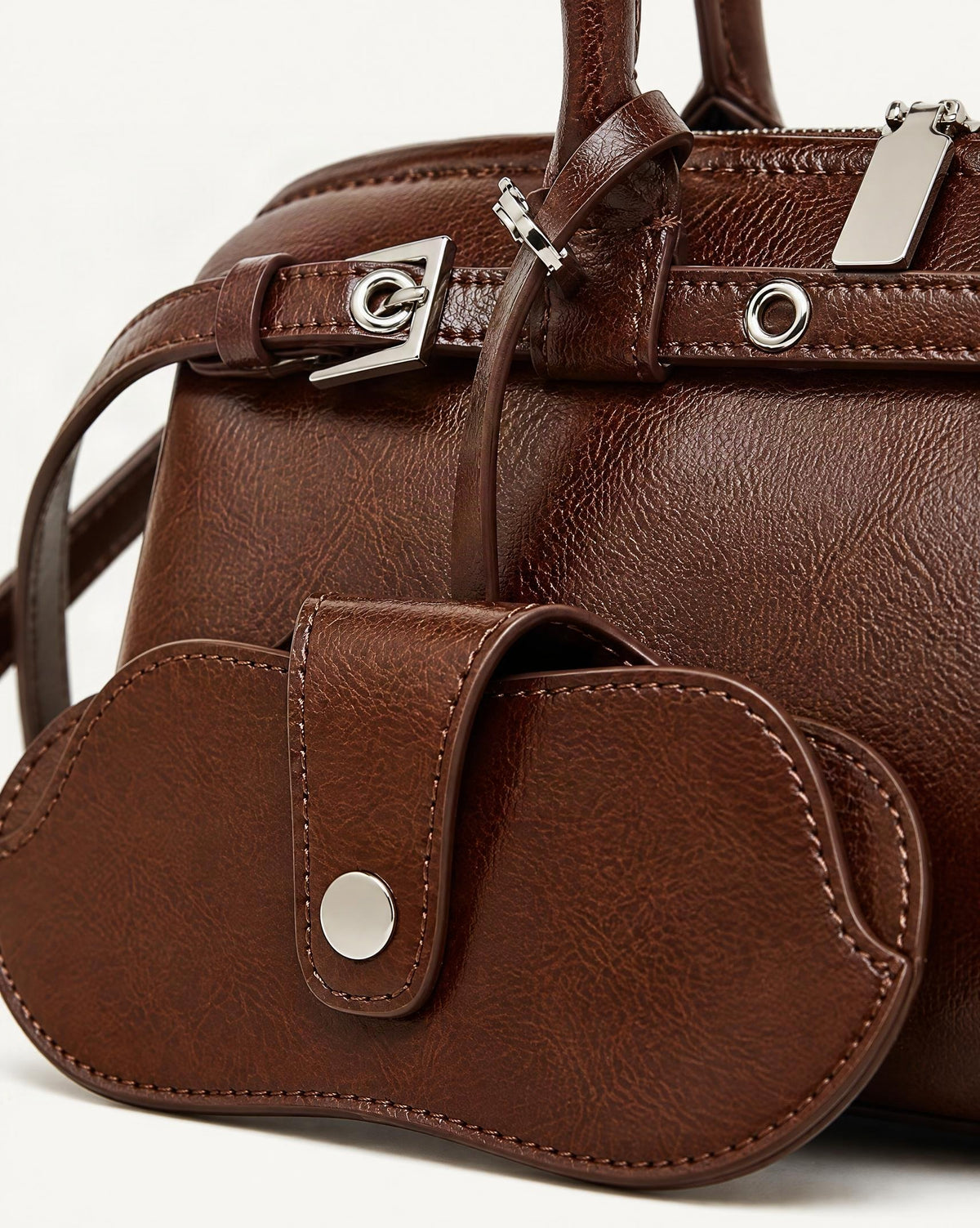 Cowhide Leather Small Barrel Tote with Sunglass Pouch hardware and cowhide detail, close up