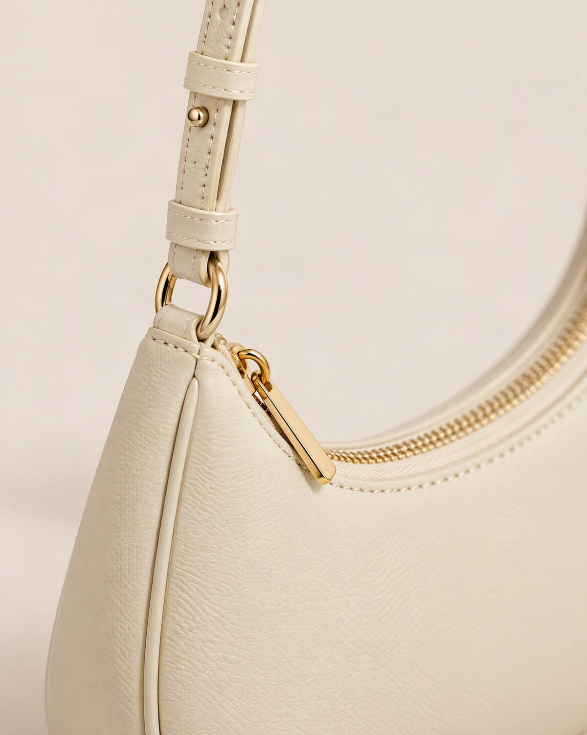 Cowhide Leather Crescent Hobo Shoulder Bag hardware and cowhide detail, close up