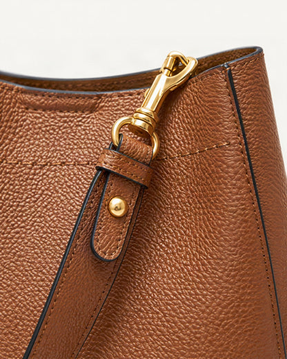 Cowhide Leather Small Bucket Tote Bag hardware and cowhide detail, close up