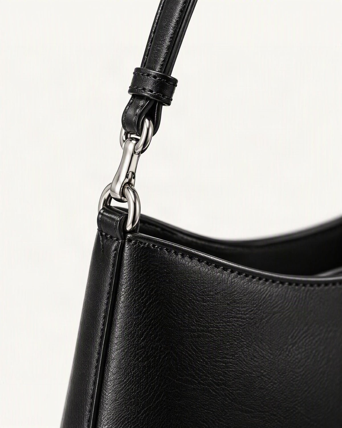 Cowhide Leather Underarm Shoulder Bag with Stitched Detail hardware and cowhide detail, close up
