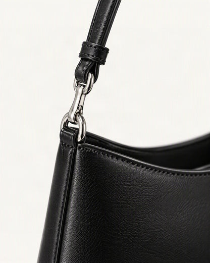 Cowhide Leather Underarm Shoulder Bag with Stitched Detail hardware and cowhide detail, close up