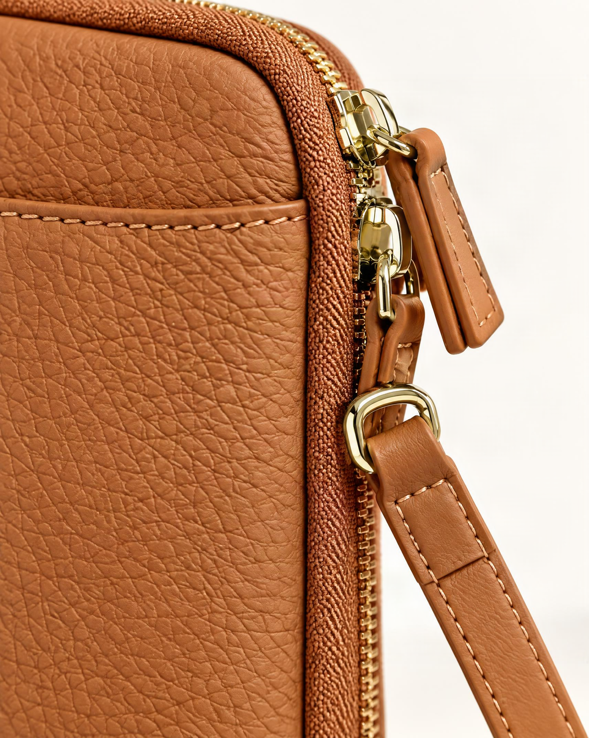 Cowhide Leather Micro Crossbody Phone Bag hardware and cowhide detail, close up