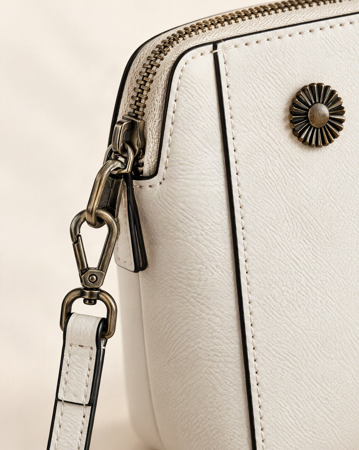 Cowhide Leather Micro Crossbody Phone Bag with Zip Closure hardware and cowhide detail, close up