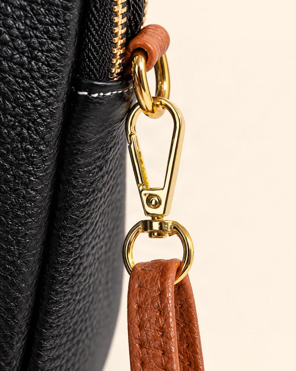 Cowhide Micro Crossbody Phone Bag with Detachable Strap hardware and cowhide detail, close up