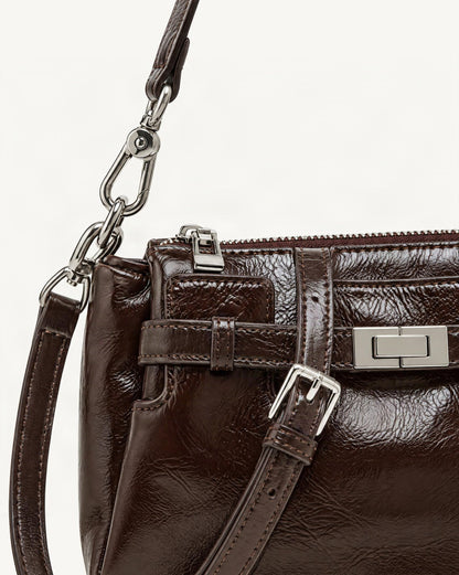 Top-Grain Waxed Leather Shoulder Bag with Adjustable Strap hardware and cowhide detail, close up