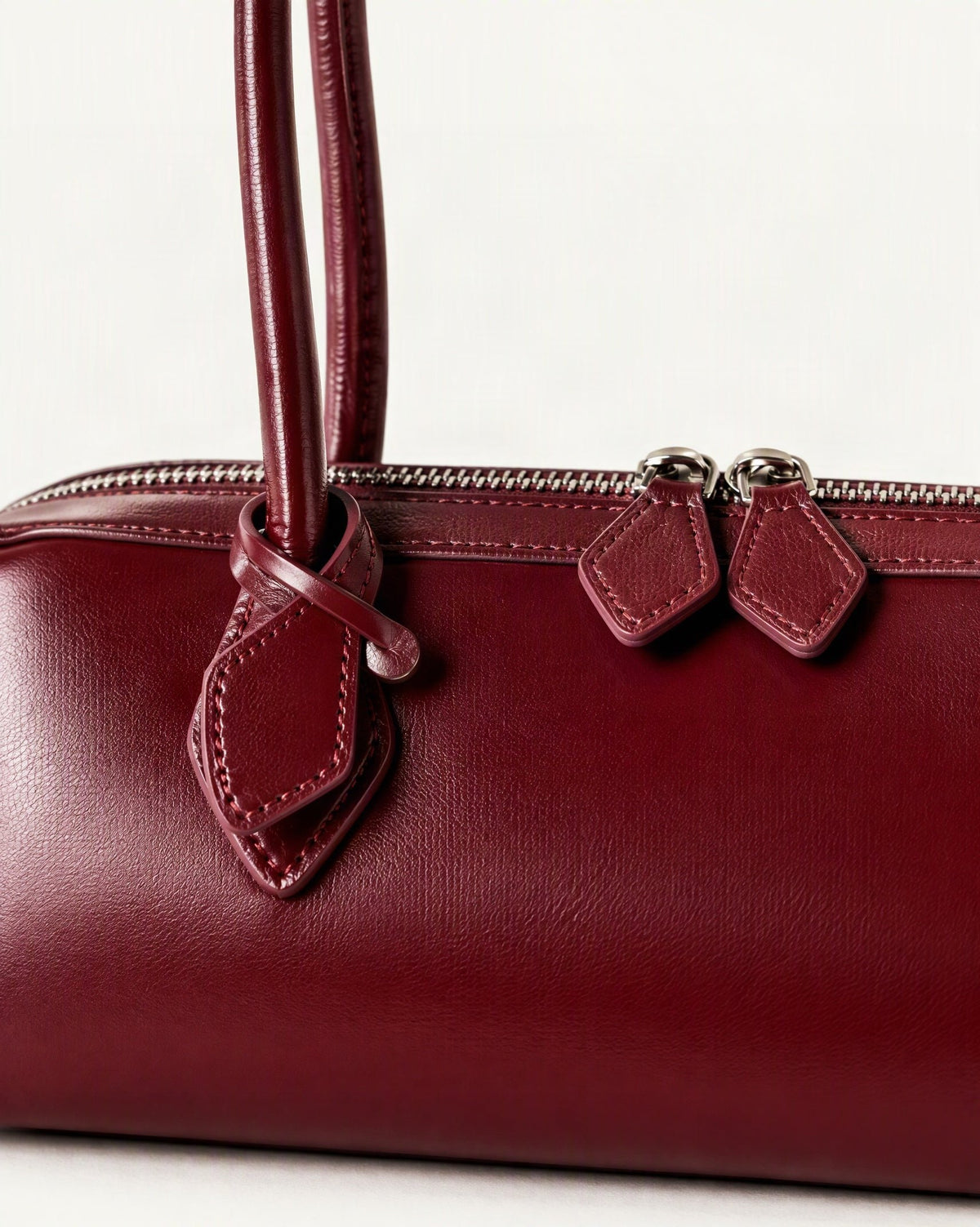 Cowhide Leather Small Plus Shoulder Baguette Bag hardware and smooth cowhide detail, close up