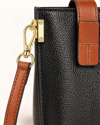 Cowhide Micro Crossbody Phone Bag hardware and cowhide detail, close up