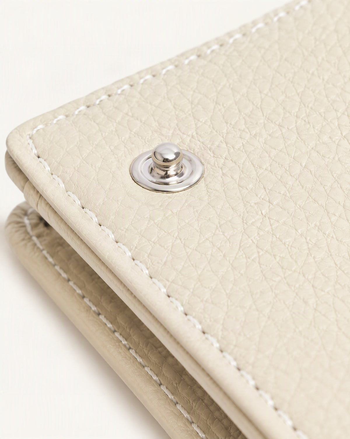 Cowhide Leather Tri-Fold RFID-Blocking Wallet hardware and cowhide detail, close up
