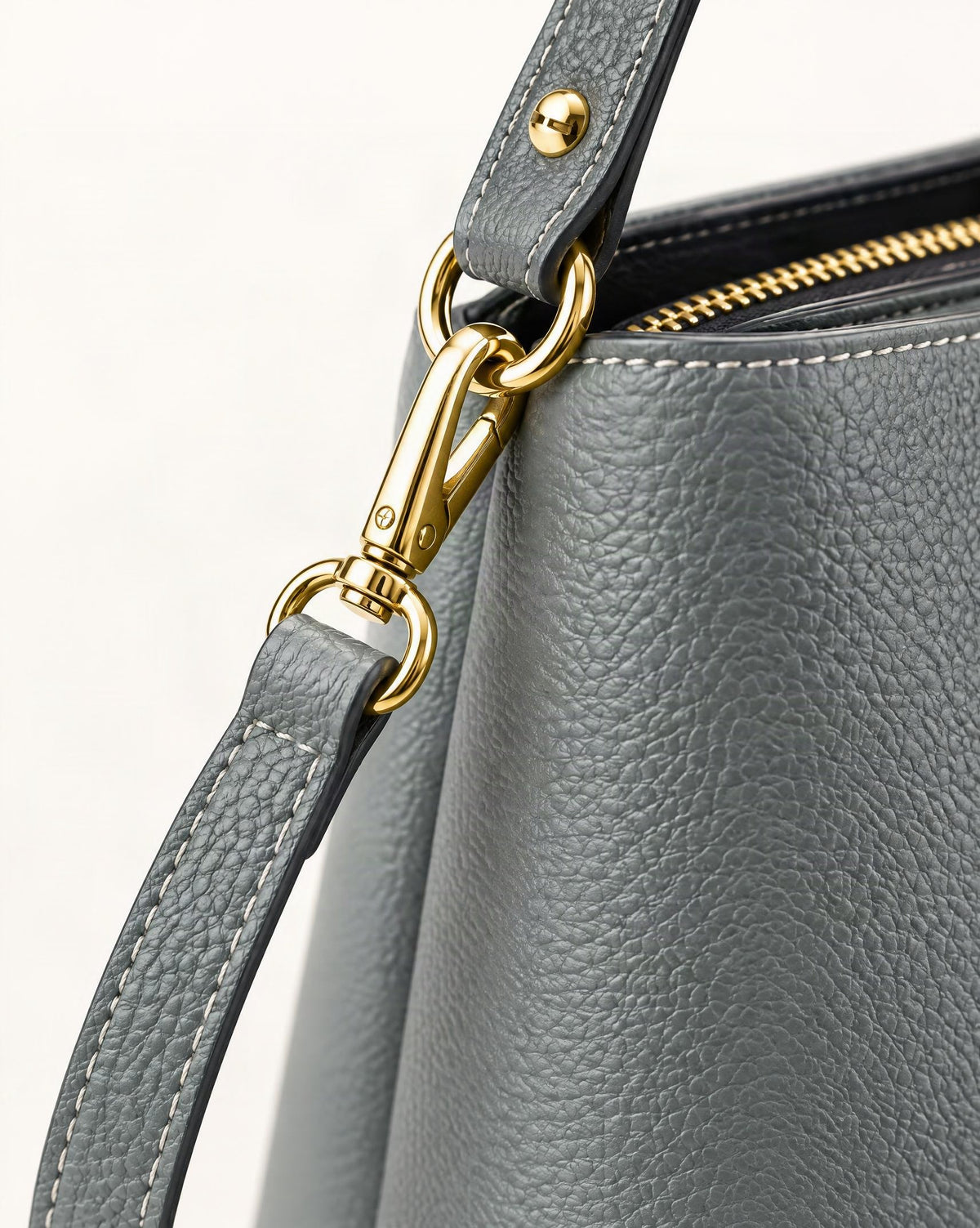Cowhide Leather Crescent Bucket Bag hardware and cowhide detail, close up