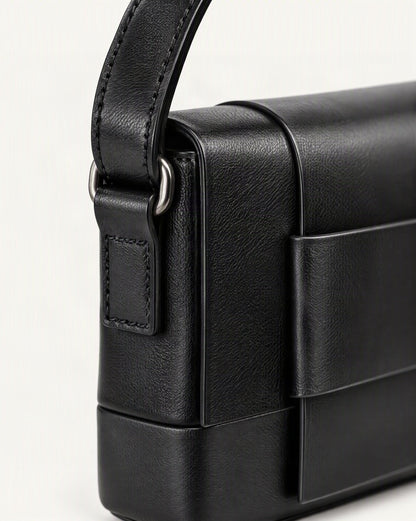 Cowhide Leather Mini Crossbody Bag with Bow Detail hardware and cowhide detail, close up
