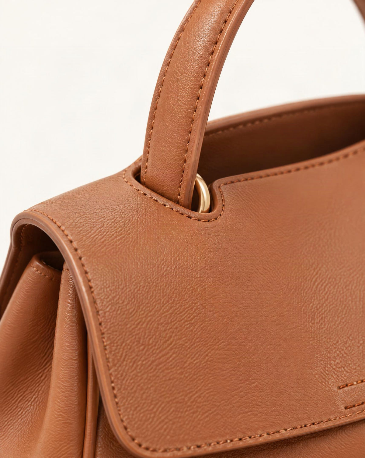 Cowhide Leather Mini Top-Handle Crossbody Bag hardware and cowhide detail, close up