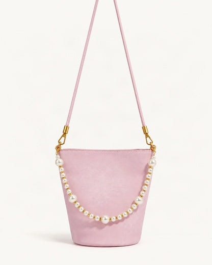 Split Leather Mini Bucket Bag with Pearl Chain — straight-on front view on a warm white background