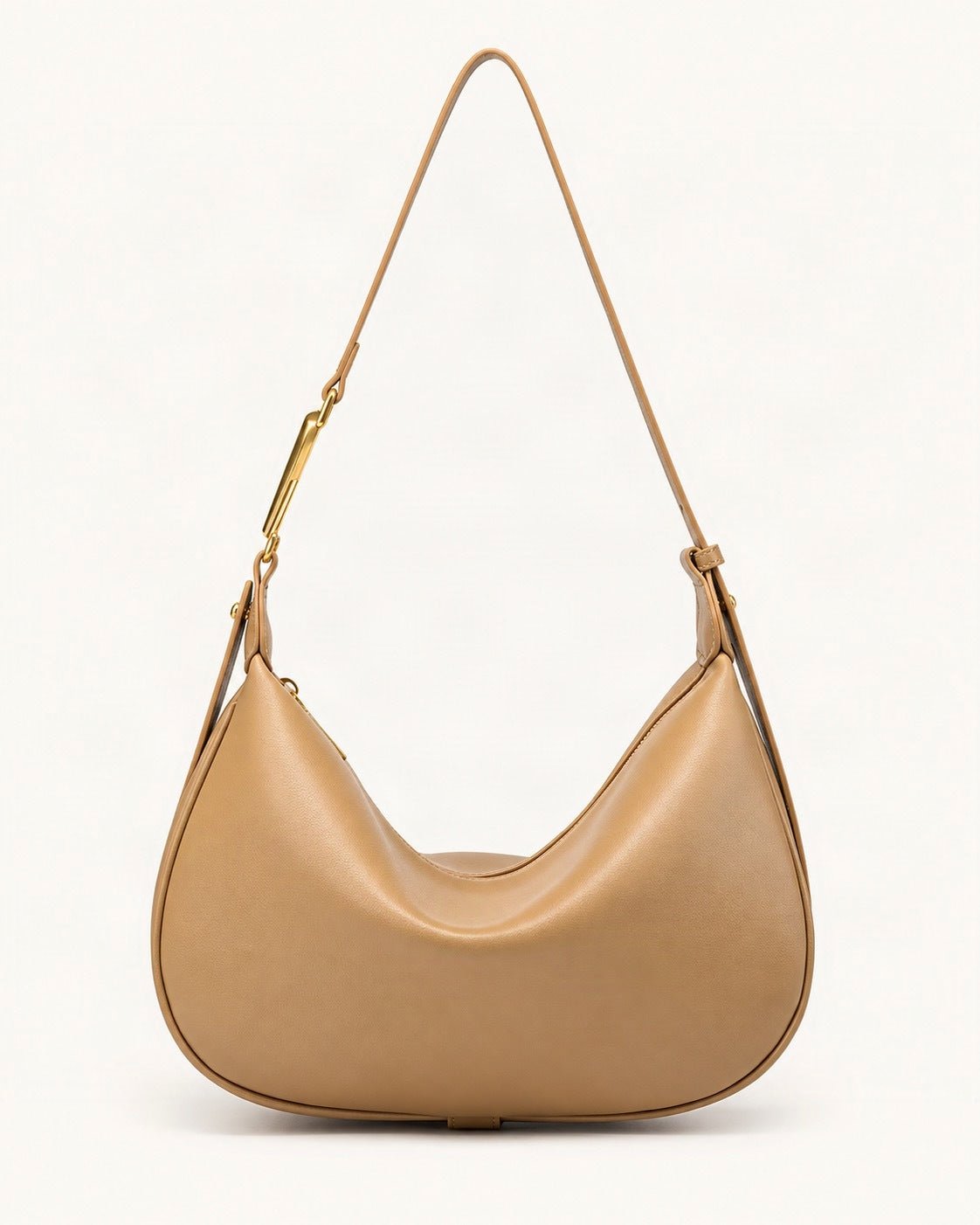Cowhide Crescent Underarm Bag with X Buckle — straight-on front view on a warm white background
