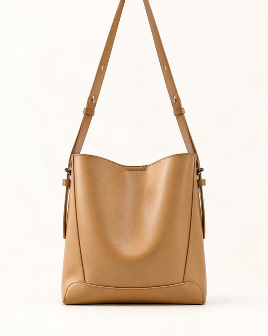 Cowhide Leather Bucket Bag - Small Capacity Crossbody — straight-on front view on a warm white background