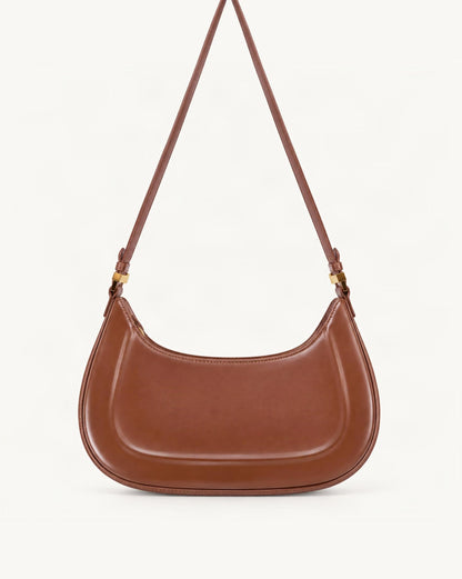 Cowhide Leather Shoulder Bag, Underarm Crossbody — straight-on front view on a warm white background